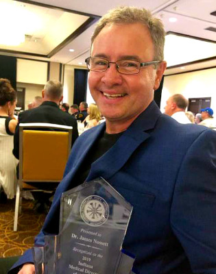 Dr. Jim Nossett receives award