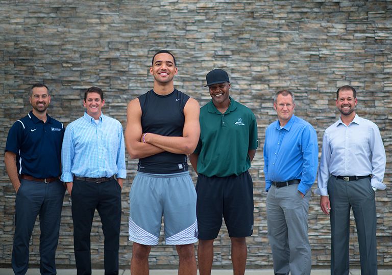Trey and Tom Lyles and their Hendricks physical therapy team