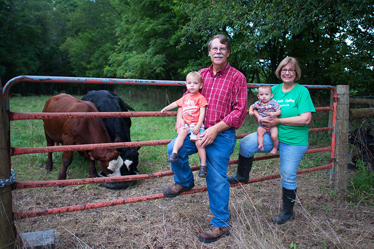 Debi, her husband Tim, and their grandsons, Archer and Brooks