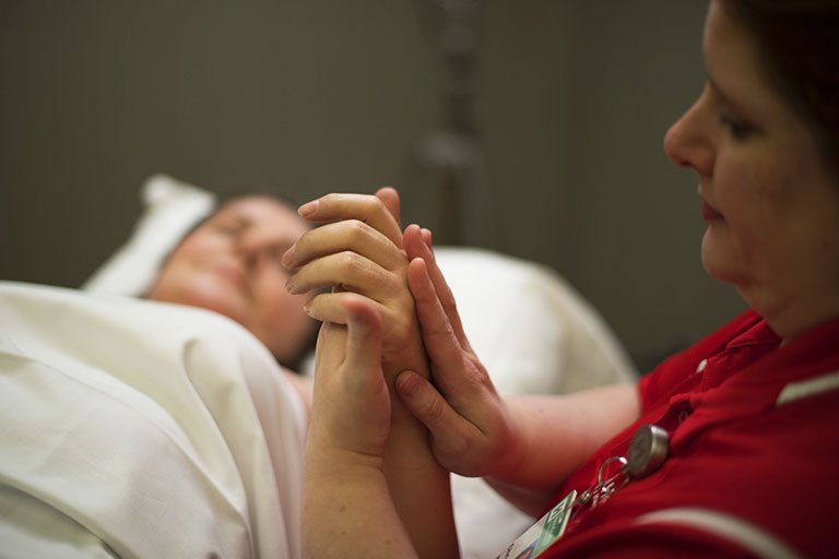 Senga with physical therapist Christy Wilson